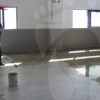 Acrylic floor primer with rolled out over floor