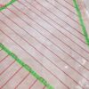 Heating cable laid with living heat wire spacer to maintain even spacings on the floor