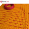 Self-adhesive decoupling mat with lug design for loose wire cables