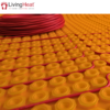 Self-adhesive decoupling mat with lug design for loose wire cables
